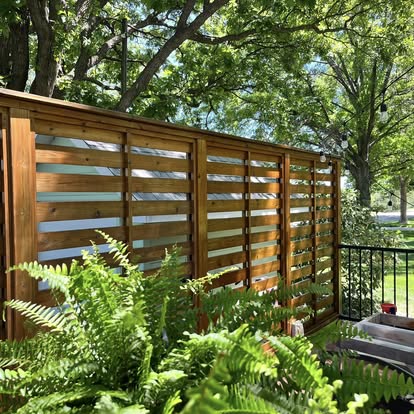 Completed exterior fence project by ALX